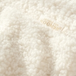 jasnokremowa-poszewka-boucle-45x45-room99.jpg
