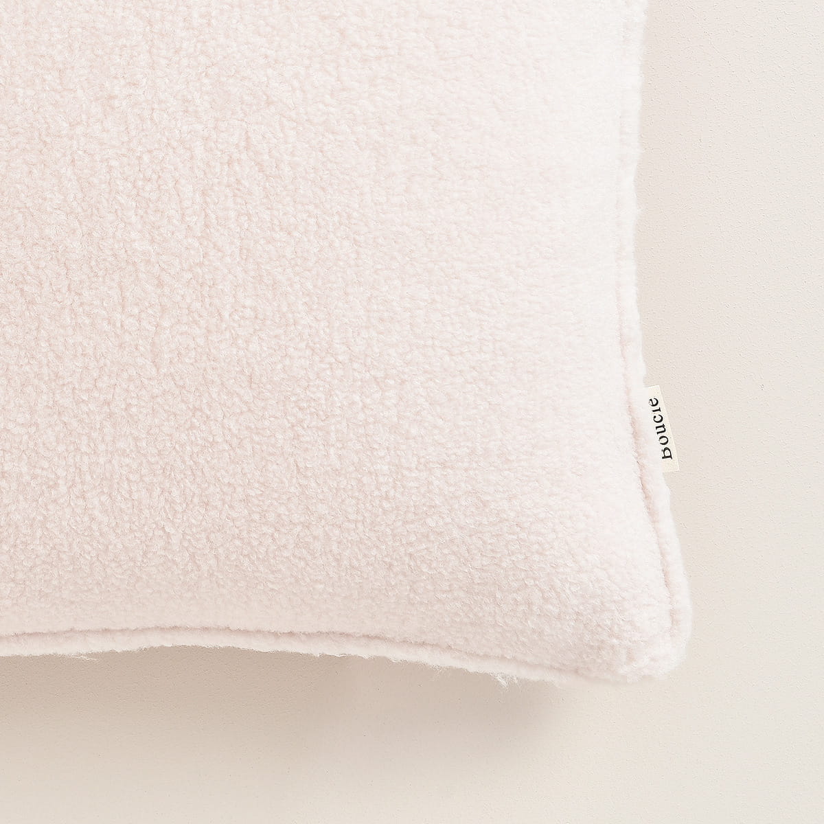 PODUSZKA DEKORACYJNA BOUCLE - KREMOWA 45x45