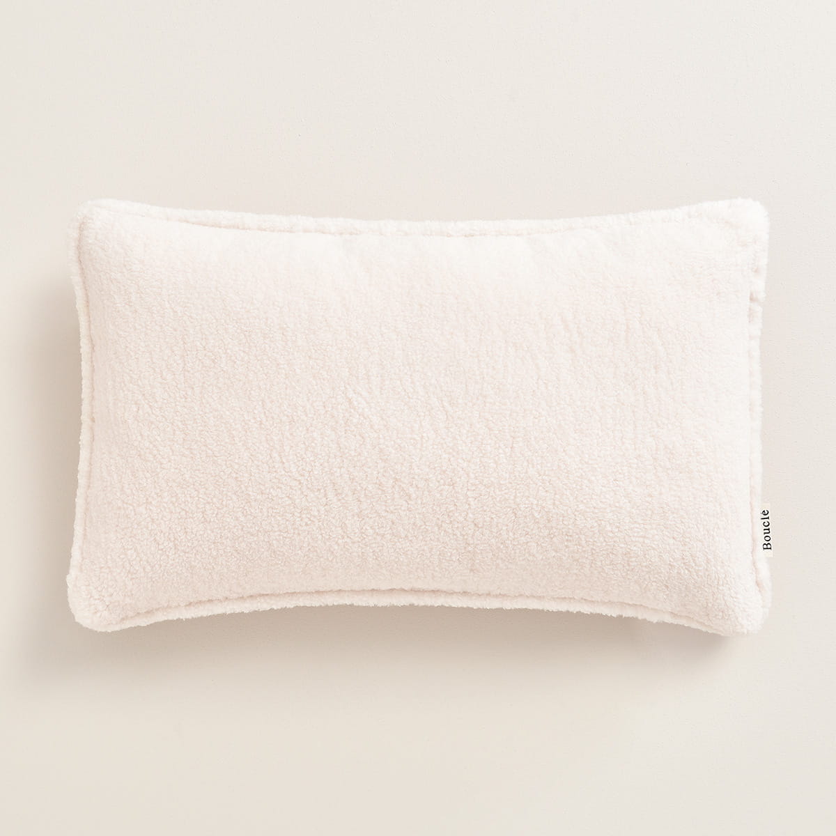  Przyjemna w dotyku poduszka ozdobna boucle 30x50 cm w kolorze kremowym 